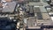 Aerial view of a drone flying over the beer production plant, several rows of tanks.