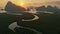 Aerial view drone flying to the sea sunrise over mountain, Phang nga, Thailand