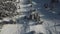 Aerial view drone freerider snowboarder ride in powder snow