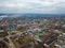 Aerial view from drone of industrial zone with fuming chimneys. Chemical plant