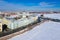 aerial view from drone Kunstkammer, Rostral column, Peter and Paul Fortress and the Palace Bridge across the Neva River in St.