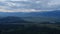 Aerial view from a drone on majestic valley in Altai under sunset sky