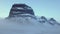 Aerial view of drone orbit around Lomagnupur mountain in winter season, Iceland