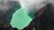 Aerial view drone orbit around to reveal Kawah Ijen volcano crater, Indonesia