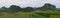 Aerial view Drone Panorama. Mountain and corn field in Rainy season.