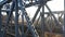 Aerial view of a drone on a railway metal bridge