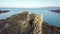 Aerial view of a drone shadow flying over the rocks at Bulls Bay on Anglesey - Wales - UK