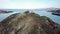 Aerial view of a drone shadow flying over the rocks at Bulls Bay on Anglesey - Wales - UK