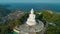 Aerial View drone shot of Big Buddha Statue on the high mountain at Phuket Thailand.