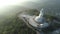 Aerial View drone shot of Big Buddha Statue on the high mountain at Phuket thailand.