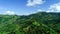 Aerial view drone shot Hyperlapse of Asphalt road curve on mountain tropical rainforest