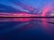 Aerial view of drone shot over water surface in twilight, golden hour sunset. Amazing view, firth surface reflecting