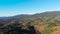 Aerial view drone shot scenic landscape tropical nature tree forest against a mountain