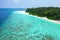 Aerial view with drone of an tropical exotic island paradise with turquoise crystal clear water