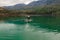 Aerial view by drone of a woman practicing Stand Up Paddle or SUP on lake