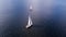 Aerial view from the drone of the yachts with white sails at sea
