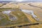 Aerial view of a drought affected agricultural dam in regional Australia