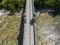 Aerial view. Drought and dry rivers. Roman bridge of Bobbio over the Trebbia river, Piacenza, Emilia-Romagna. Italy