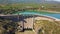 Aerial view of the dry spillway of a concrete dam during a long drought