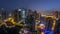 Aerial view of Dubai Marina residential and office skyscrapers with waterfront night to day timelapse