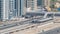 Aerial view of Dubai Tram in Dubai marina timelapse.