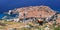 Aerial view of Dubrovnik Old Town on coast of Adriatic Sea with the funicular on the foreground, Croatia