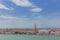 Aerial view of Ducal Palace and St. Mark`s Bell Tower by water a