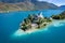 Aerial view of Duingt castle or Chateau de Duingt in Annecy lake, Haute Savoie, France