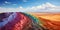 aerial view of the dunes in the desert with colorful rainbow sand