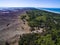 Aerial view with dunes, forest and sea in Curonian spit on a sunny day photographed with a drone.