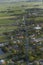 Aerial view of dutch farmland village along rural road