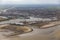 Aerial view Dutch harbor Delfzijl with wind turbines and factories