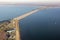 Aerial view Dutch Haringvliet dam with motorway in wintertime