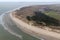 Aerial view Dutch island Ameland with beach and lighthouse