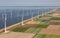 Aerial view Dutch landscape with offshore wind turbines along coast