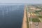 Aerial view Dutch landscape with offshore wind turbines along coast