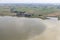 Aerial view Dutch village Gaast at lake IJsselmeer with shallow water