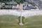 Aerial view Dutch village Makkum with beach and swimming people