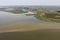 Aerial view Dutch village Makkum at lake IJsselmeer with shallow water