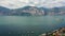 Aerial view from east coast of lake Garda between Brenzone and Malcesine,  with a panning shot across the lake
