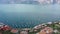 Aerial view from east coast of lake Garda between Brenzone sul Garda and Assenza,  with a panning shot across the lake with Trimel