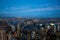 Aerial view of east side of Manhattan and Brooklyn bridges showing lights in the variety of shapes and patterns of buildings on sh