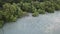 Aerial view egrets and Asian open bill walk on the swamp looking for food.