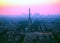 Aerial view of Eiffel tower, La Defense and the rooftops of Paris during a gorgeous sunset, France