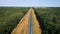 Aerial View Of An Electric Train With Cargo Railway Wagon Transportation By Rail