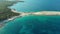 Aerial view of Emplisi Beach, picturesque stony white pebble beach