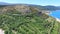 Aerial view of empty paved road passing artificial lake of Peruca, Croatia