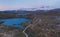 Aerial view empty road in mountains landscape Norway sunset scenery