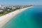 Aerial view of empty South Beach, Florida during COVID-19 beach closure.