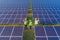 Aerial view of engineer or worker, people, with solar panels or solar cells on the roof in farm. Power plant with green field,